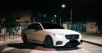 white mercedes benz coupe on road during night time