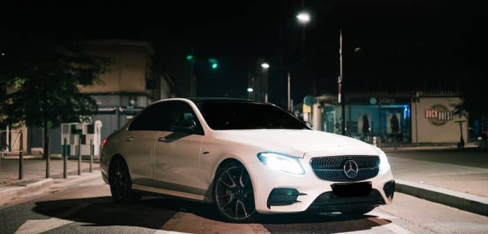 white mercedes benz coupe on road during night time